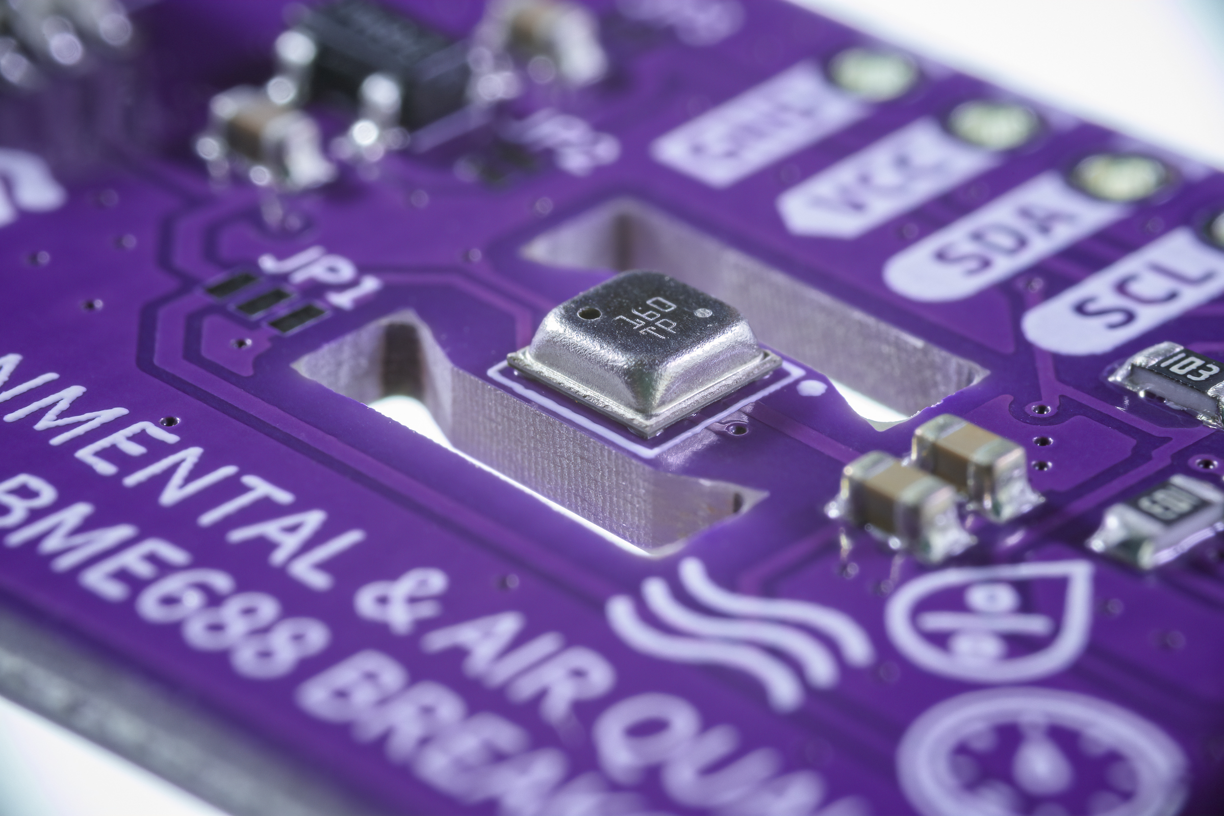 Close-up of the BME688 gas sensor chip on a purple Soldered breakout board