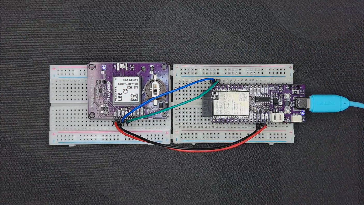 L86-M33 GNSS GPS breakout wired to a NULA board on two breadboards with TX, RX, power and ground wires