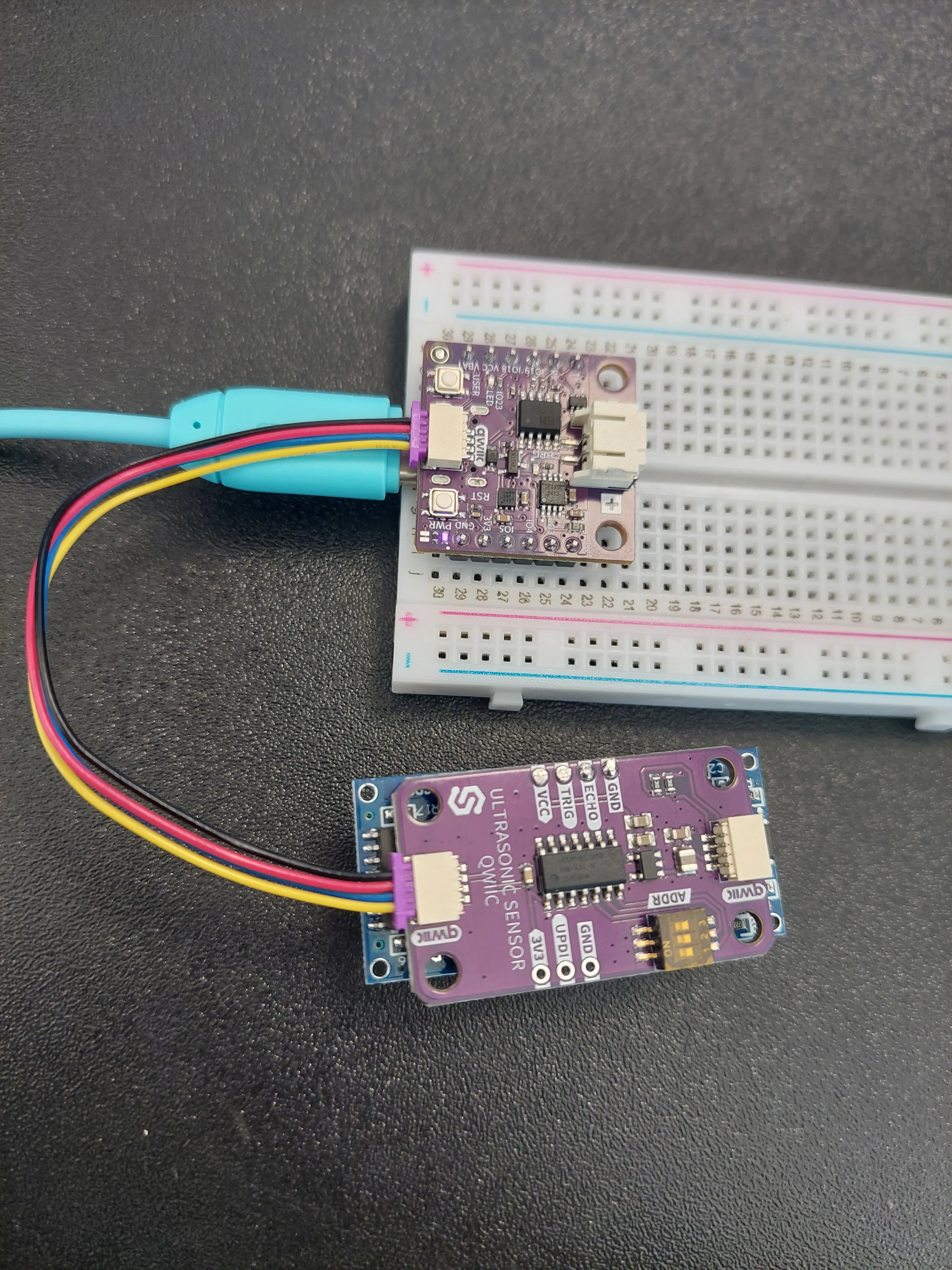 An ultrasonic distance sensor connected to a NULA ESP32 board with a single Qwiic cable
