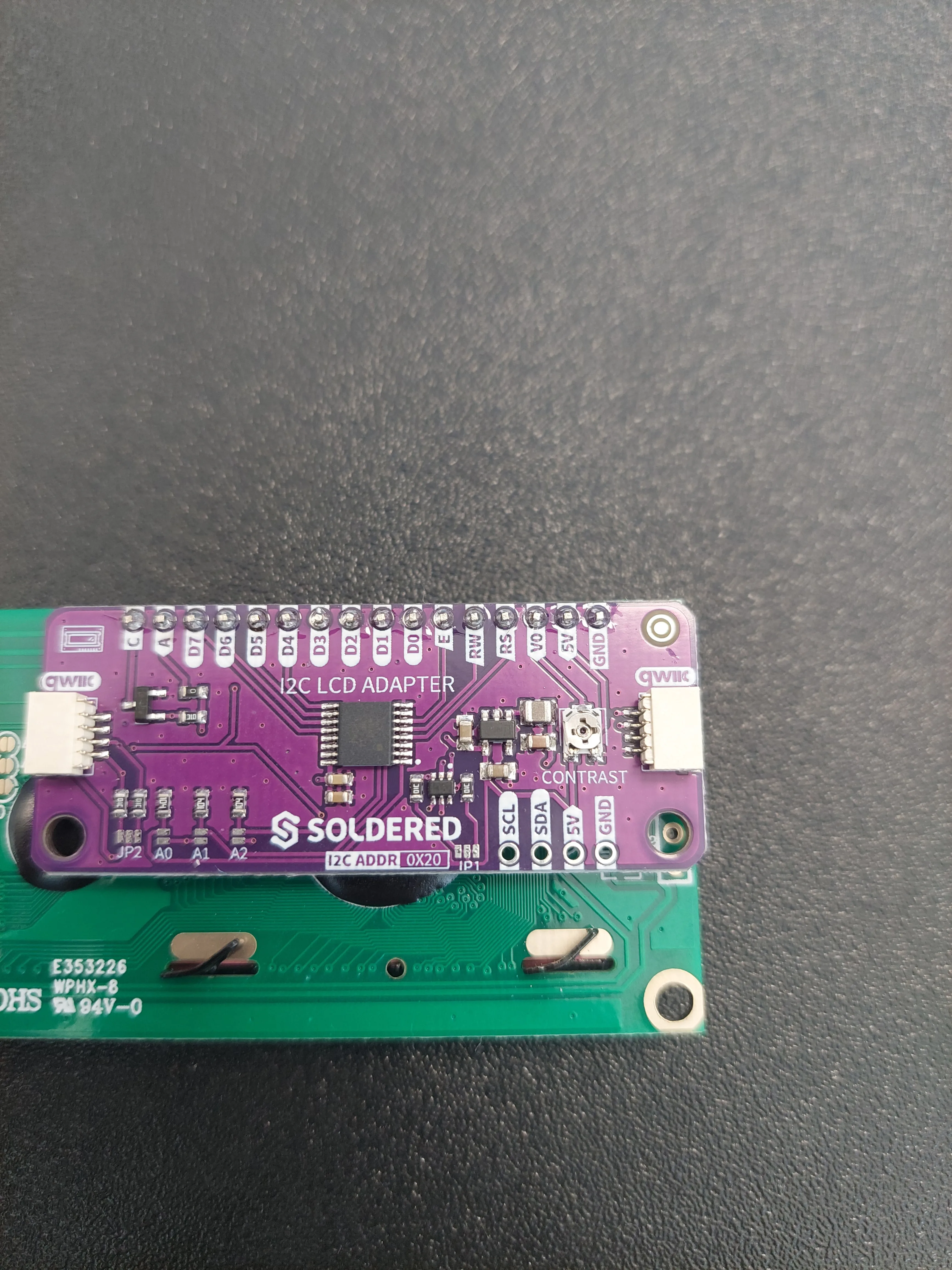 Back of a 16x2 LCD with the Soldered I2C LCD adapter board and its Qwiic connector